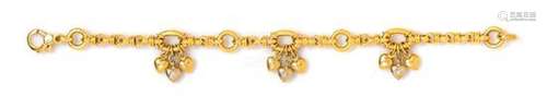 An 18 Karat Yellow Gold and Diamond Charm Bracelet,