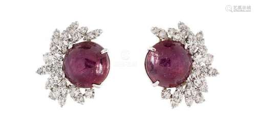 * A Pair of Platinum, Star Ruby and Diamond Earclips,