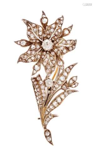 A Silver Topped Rose Gold and Diamond Flower Brooch,