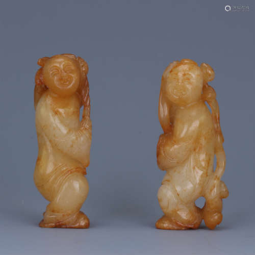 TWO CHINESE JADE BOYS WITH LOTUS