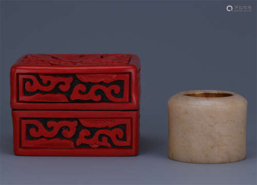 CHINESE WHITE JADE ARCHER'S RING IN CINNABAR CASE