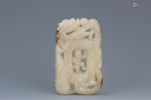 CHINESE WHITE JADE PIERCED CARVED BOY AND DRAGON PLAQUE