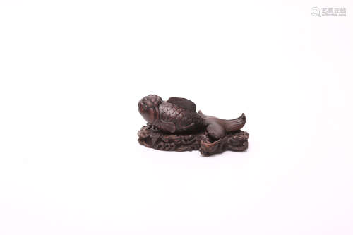 A Chinese Carved Zitan Decoration with Stand