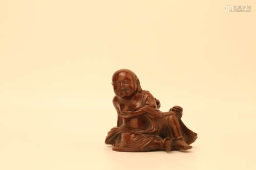 A Chinese Carved Huangyang Wood Figure