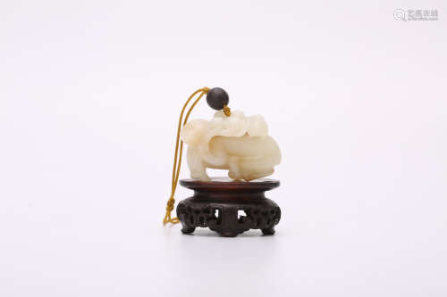 A Chinese Carved Jade Decoration with Stand