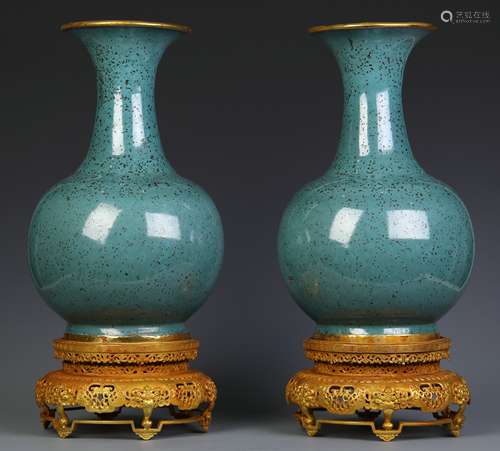 A Pair Of Celadon Glazed Porcelain Vases