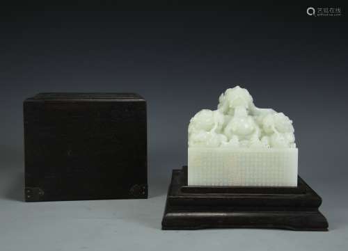 A Chinese Carved Jade Seal with Case