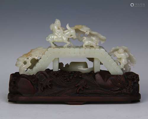 A Chinese Carved Jade Decoration With Figures