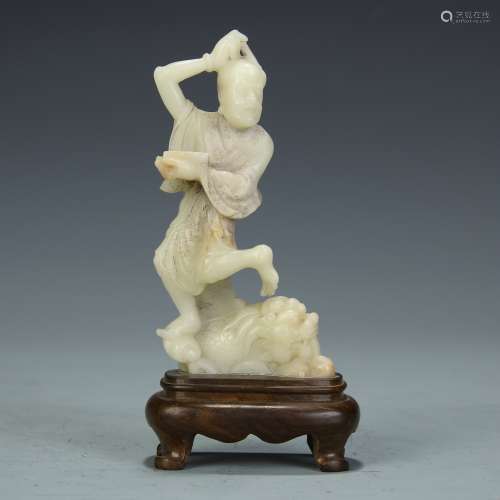 A Chinese Carved Jade Figer with Stand