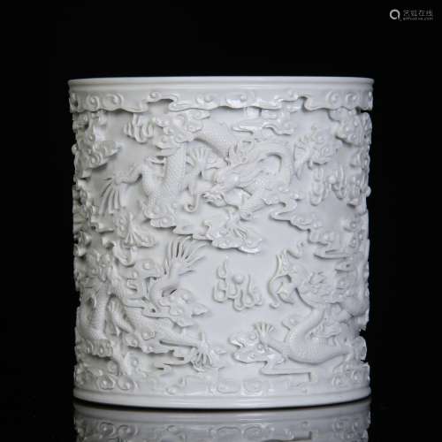A Chinese White Porcelain Carved Brush Pot