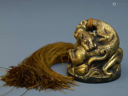 A Chinese Gilt Bronze Paperweight