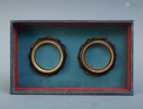 A Pair Of Chinese Chenxiang Wood Glit Bracelet