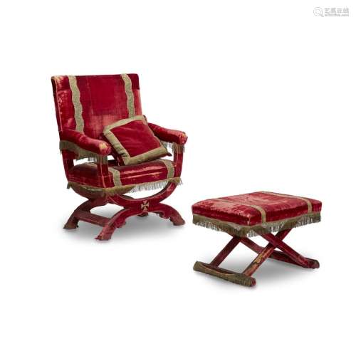 A RENAISSANCE STYLE VELVET UPHOLSTERED CURULE ARMCHAIR AND FOOTSTOOL