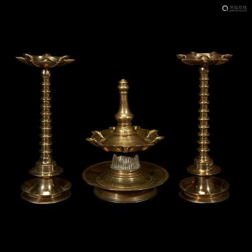 A GROUP OF OTTOMAN TURNED AND CAST BRASS OIL LAMP STANDS