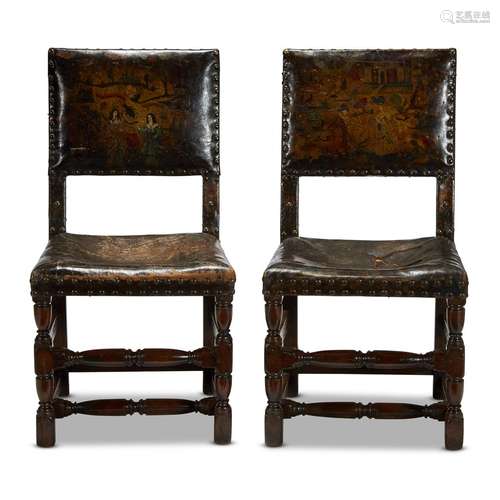 A RARE PAIR OF CHARLES II OAK AND POLYCHROME PAINTED CORDOVAN LEATHER CHAIRS