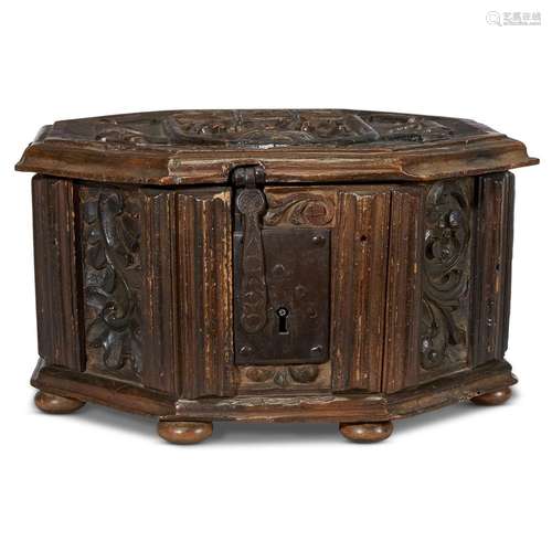 A FRENCH OR FLEMISH LATE GOTHIC CARVED WALNUT OCTAGONAL CASKET