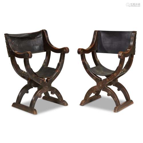 A PAIR OF SPANISH IVORY INLAID WALNUT CURULE CHAIRS WITH LEATHER UPHOLSTERY