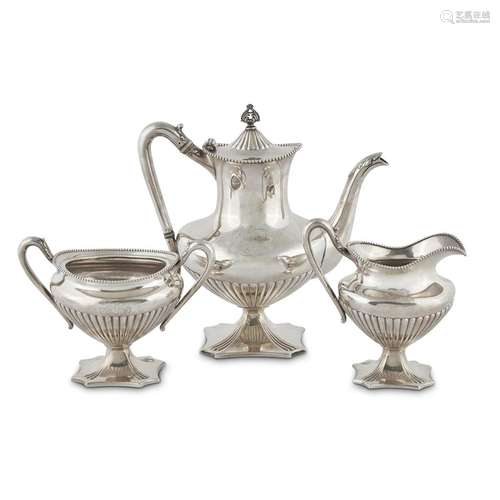 AN AMERICAN STERLING SILVER GILT-WASHED THREE PIECE TEA SERVICE