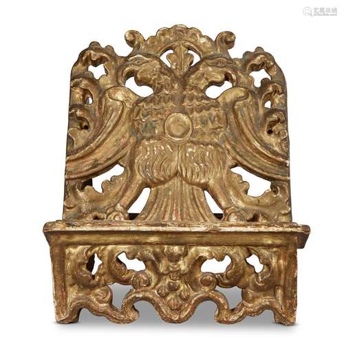 A SPANISH BAROQUE CARVED AND GILTWOOD BIBLE STAND