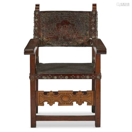 A SPANISH BAROQUE WALNUT AND TOOLED LEATHER CHAIR