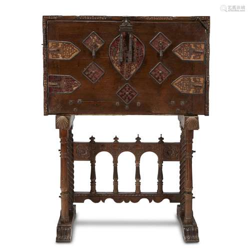 A FINE SPANISH BAROQUE IRON-MOUNTED AND VELVET-LINED PARCEL-GILT WALNUT VARGUEÑO ON STAND