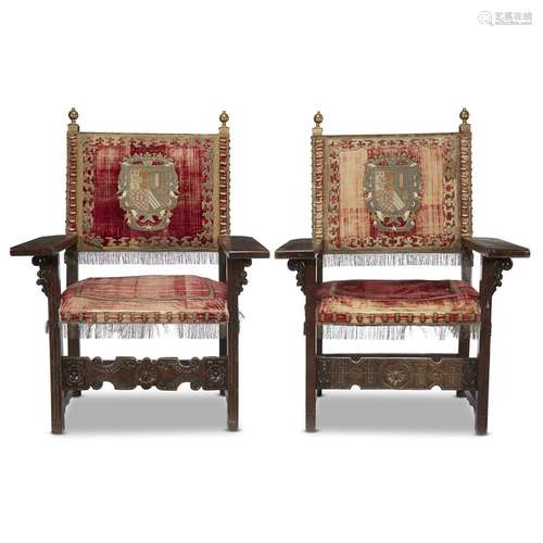 A PAIR OF SPANISH BAROQUE BRASS-MOUNTED WALNUT ARMORIAL ARMCHAIRS