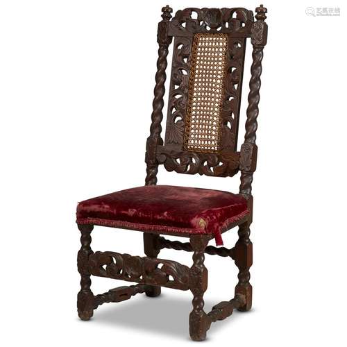 A JAMES II/WILLIAM & MARY CARVED WALNUT AND CANED SIDE CHAIR