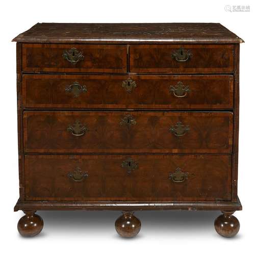 A QUEEN ANNE OYSTER VENEERED WALNUT CHEST OF DRAWERS