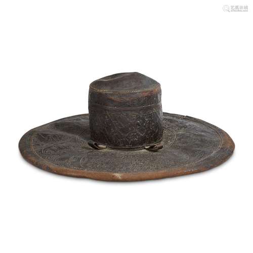 A SPANISH COLONIAL TOOLED LEATHER MILITARY HAT