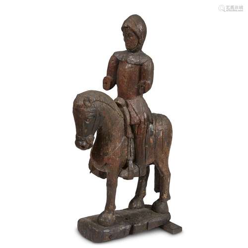 A FRENCH GOTHIC OAK EQUESTRIAN STATUE OF SAINT MARTIN DE TOURS WITH TRACES OF ORIGINAL PIGMENT