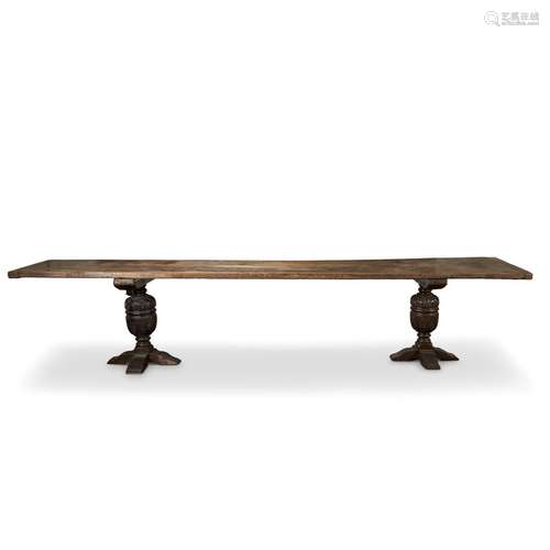 A LARGE JACOBEAN ELM AND OAK REFECTORY TABLE