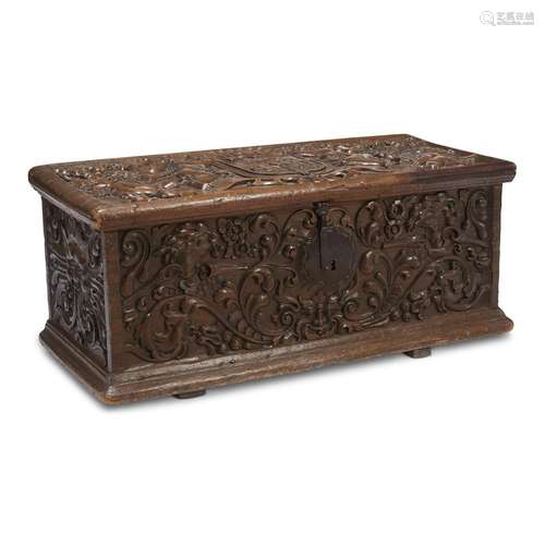 A SPANISH RENAISSANCE STYLE IRON-MOUNTED CARVED PINE BLANKET CHEST