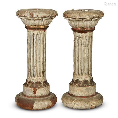 A PAIR OF NEOCLASSICAL GESSOED PINE CANDLESTICKS