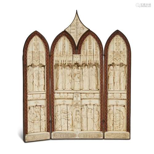 A NORTH ITALIAN CARVED BONE, IVORY AND FRUITWOOD INLAID WALNUT TRIPTYCH ALTARPIECE