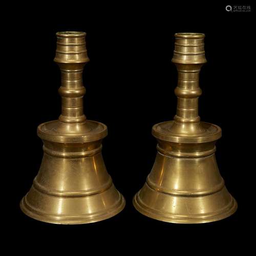 A LARGE PAIR OF OTTOMAN CAST AND TURNED BRASS CANDLESTICKS