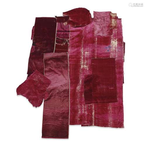 A LARGE ASSEMBLED COLLECTION OF ITALIAN CRIMSON SILK FRAGMENTS AND PANELS