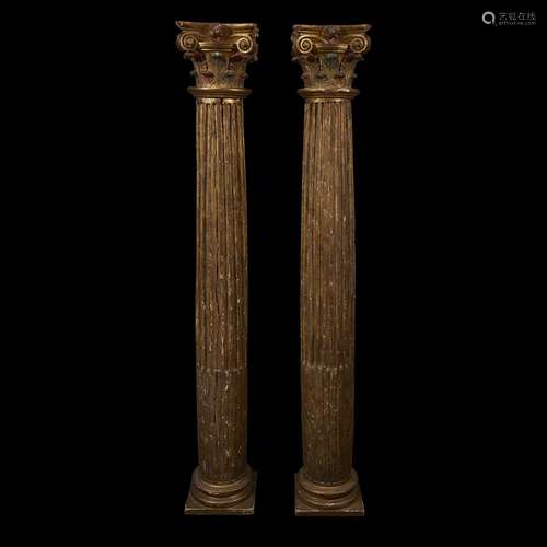 A PAIR OF SPANISH POLYCHROME GILTWOOD CORINTHIAN COLUMNS