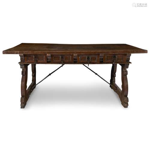 A SPANISH BAROQUE IRON-SPRUNG WALNUT LIBRARY TABLE