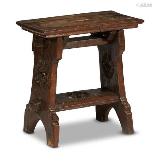 AN ENGLISH LATE GOTHIC CARVED OAK JOINED STOOL