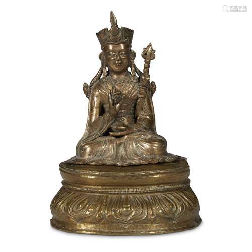 A TIBETAN CAST AND REPOUSSÉ BRASS FIGURE OF PADMASAMBHAVA