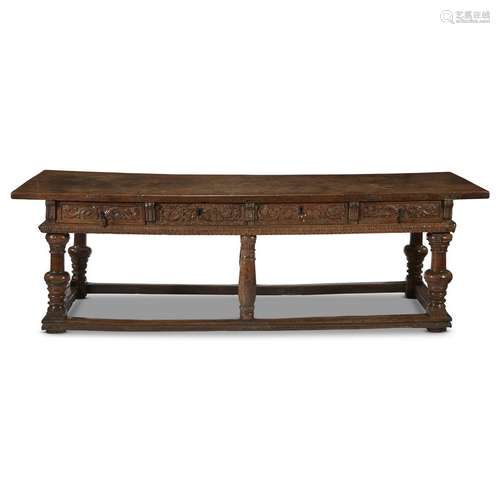 AN IMPRESSIVE SPANISH RENAISSANCE CARVED WALNUT REFECTORY TABLE