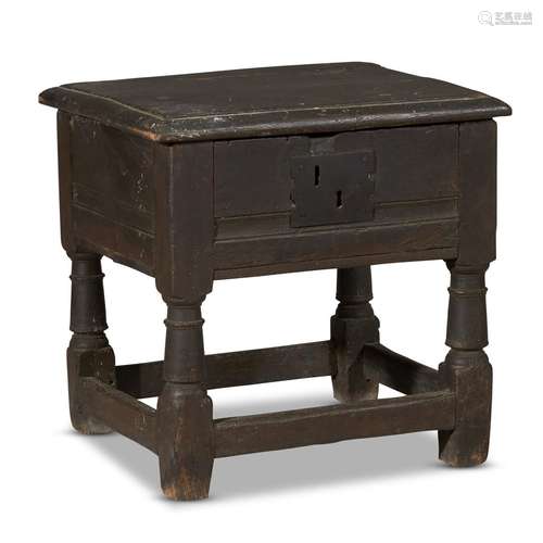 A JACOBEAN CARVED OAK JOINED WORKSTAND