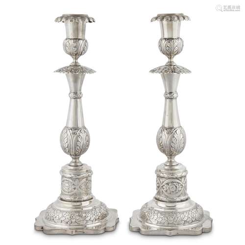 A PAIR OF MEXICAN SILVER CANDLESTICKS