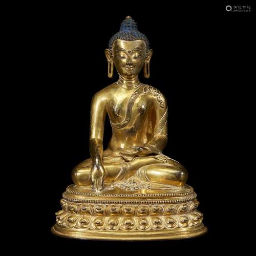 A TIBETAN GILT COPPER ALLOY FIGURE OF SHAKYAMUNI BUDDHA