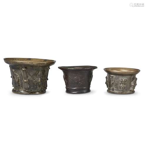 THREE SPANISH CAST BRONZE MORTARS  WITH MASQUE AND FLANGE DECORATION