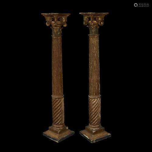 A PAIR OF MEXICAN CARVED GILTWOOD CORINTHIAN COLUMNS