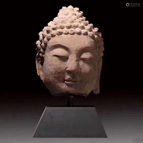 A SANDSTONE BUDDHA HEAD