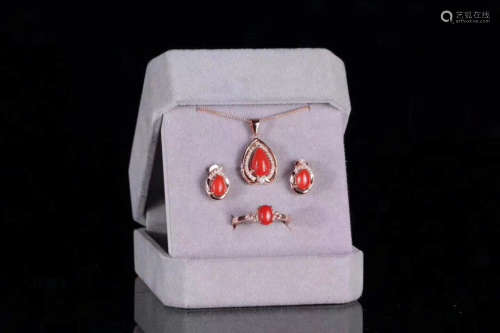A SET OF RED CORAL JEWELRY