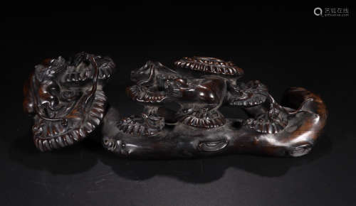 A CHENXIANG WOOD CARVED DRAGON ORNAMENT