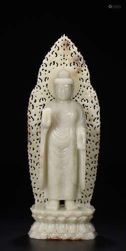 A HETIAN JADE FIGURE OF SAKYAMUNI